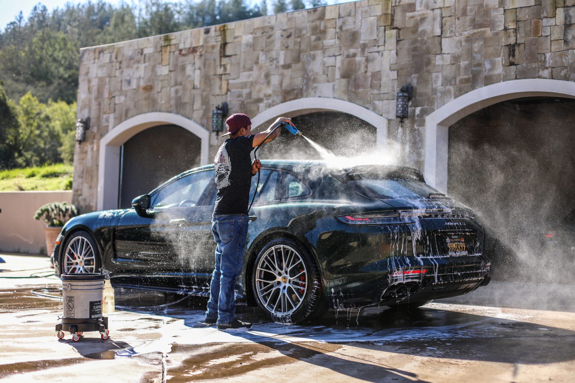 person washing a car